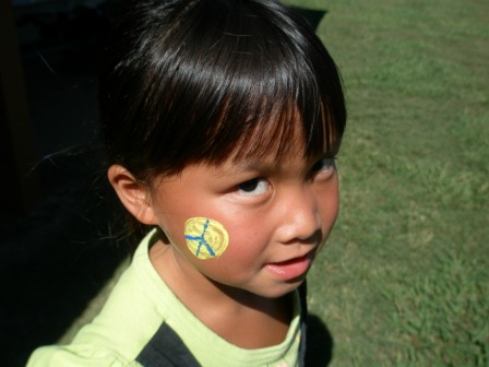 Kasen with face painting at Sarah's party